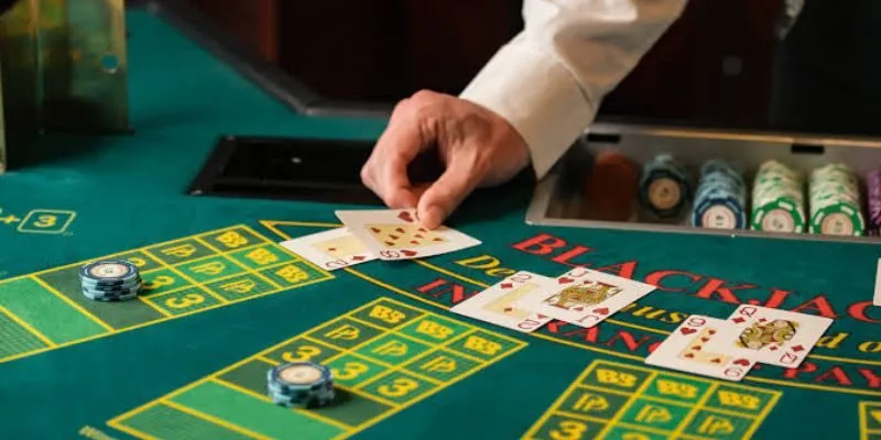 Blackjack payout examples showing a natural blackjack, regular win, push, and dealer bust.